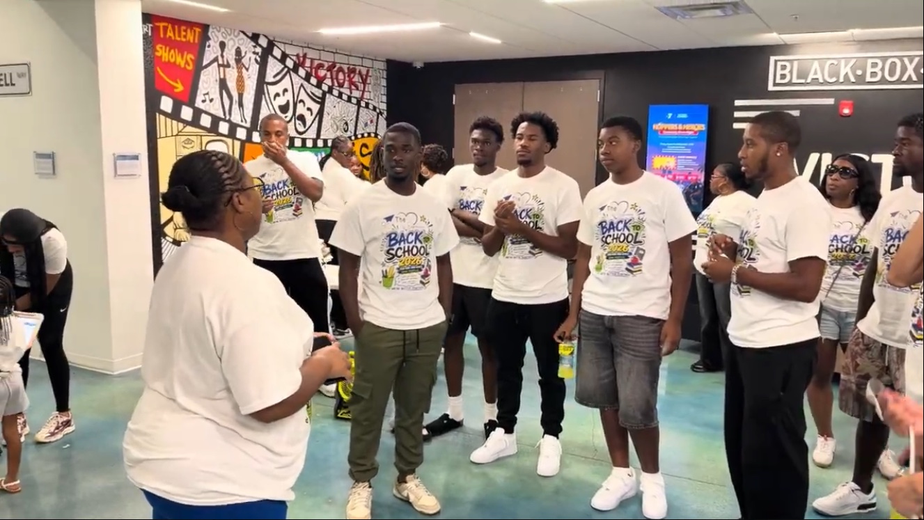 Experience Foundation volunteers gathered for a Back to School community event
